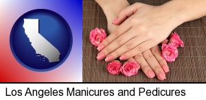 a manicure (pink fingernails) in Los Angeles, CA