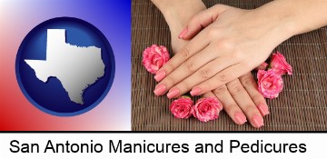 a manicure (pink fingernails) in San Antonio, TX