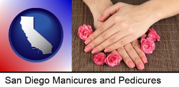 a manicure (pink fingernails) in San Diego, CA