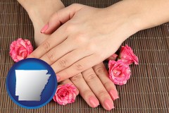 arkansas map icon and a manicure (pink fingernails)