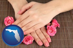 florida map icon and a manicure (pink fingernails)