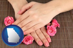 georgia map icon and a manicure (pink fingernails)