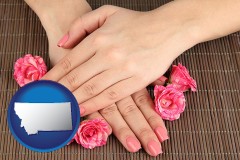 montana map icon and a manicure (pink fingernails)