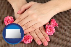 north-dakota map icon and a manicure (pink fingernails)