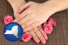 new-york map icon and a manicure (pink fingernails)