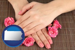 pennsylvania map icon and a manicure (pink fingernails)