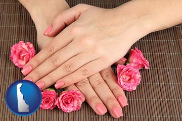 a manicure (pink fingernails) - with Delaware icon