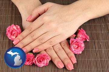 a manicure (pink fingernails) - with Michigan icon