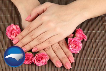 a manicure (pink fingernails) - with North Carolina icon
