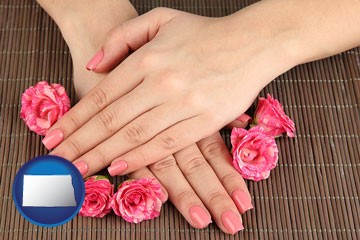 a manicure (pink fingernails) - with North Dakota icon
